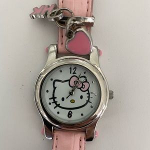 Hello Kitty themed watch with leather band and charms